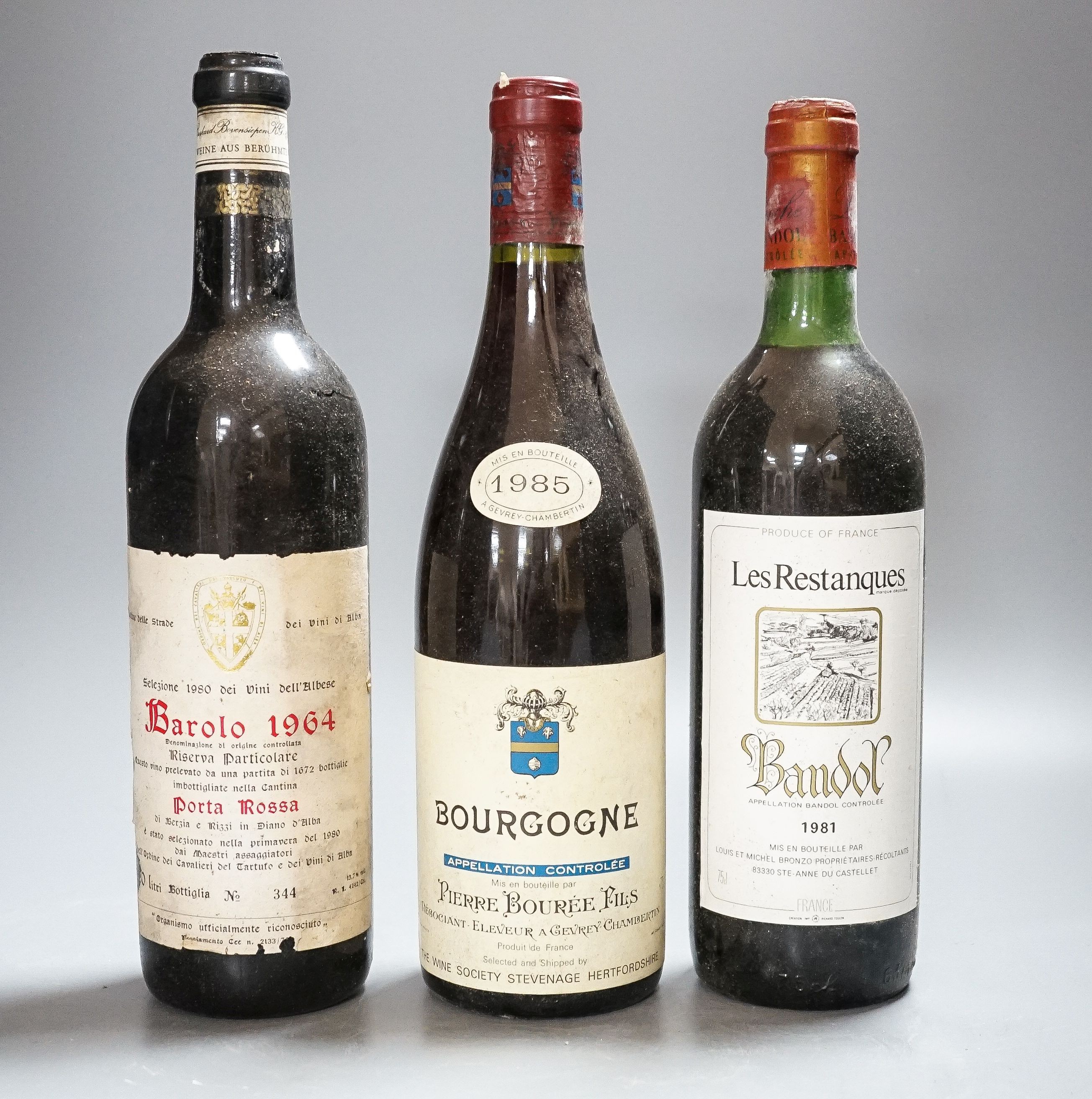 A collection of 24 bottles of red wines including 9 bottles of 1985 Bourgogne, 2 bottles of 1964 Barolo, 4 bottles 1986 Crozes Hermitage